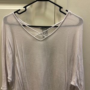 White blouse with crisscross on front chest size XS